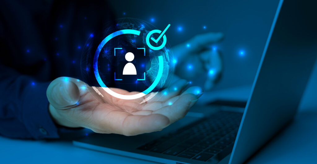 Businessman holding identity verification symbol for Increase financial security and access personal financial data. Biometrics security, qqfs, panel quality